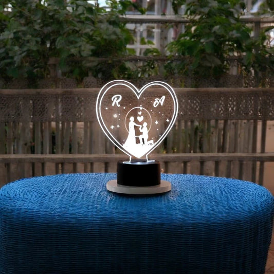 Timeless Love LED Lamp - Personalized heart-shaped lamp with couple silhouette and initials, ideal romantic gift for anniversaries or weddings.