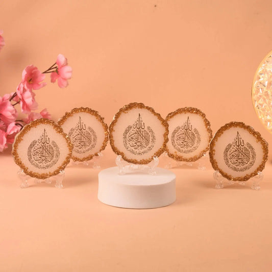 Set of five 3" Ayatul Kursi Frames with gold-trimmed edges, handmade in India, displayed on clear stands for Islamic home decor or gifting.