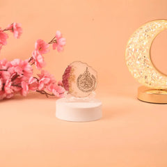 Handmade 3" Ayatul Kursi Floral Frame displayed with a crescent lamp and pink flowers, ideal for Ramadan or Eid home decor and Islamic gifting.