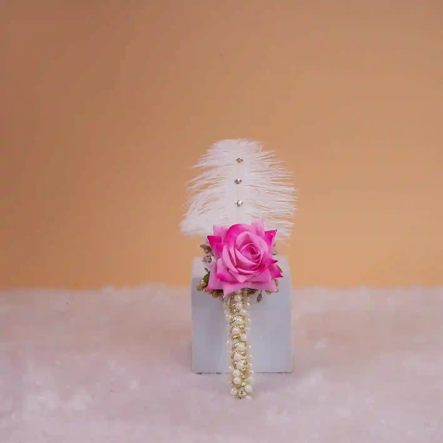 Nikah Pen with Pink Rose featuring white feather, pearl detailing, and floral embellishment, ideal for Islamic wedding ceremonies and bridal gifts.