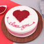 Red Velvet Romance Cake with heart-shaped red crumbs and 'I love you' icing, ideal for anniversaries and romantic celebrations.