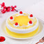Sunshine Pineapple Cake topped with whipped cream, cherries, and juicy pineapple chunks, perfect for anniversaries and same day delivery.