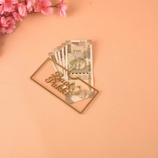 Baat Pakki Acrylic Envelope - Wedding Gift Box with gold text and currency notes, ideal for Nikah or Meher ceremonies.