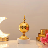 Serene Essence Bakhoor Burner - Premium gold spherical design with intricate cutouts, ideal for even scent distribution in home fragrance decor.