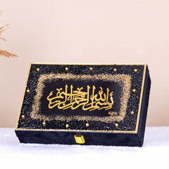 Decorative black and gold Quran gift box with Arabic calligraphy from the Bling Collection. Premium packaging for Islamic gifts.