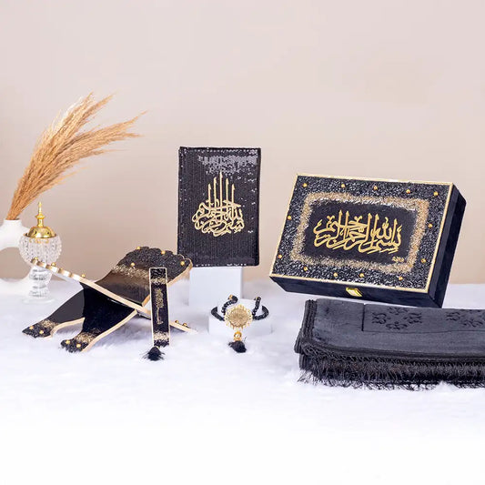 Bling Collection Islamic Gift Set in black with Quran, tasbeeh, prayer mat, rehal, and decorative box. Ideal for Eid or wedding gifting.