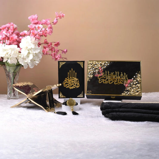 Sawab-E-Jariya Gift Hamper with black Quran, floral rehal, tasbeeh, and janamaz. Elegant Islamic gift set for special religious occasions.
