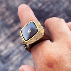 Gold-trimmed Zikr Ring with 99 Swarovski Zirconia on finger, featuring digital display. Luxurious Islamic ring for tasbeeh and prayer.