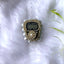 Close-up of Pearl Digital Tasbeeh in gold and white with pearl accents, a handmade digital tasbeeh counter for ceremonial use.