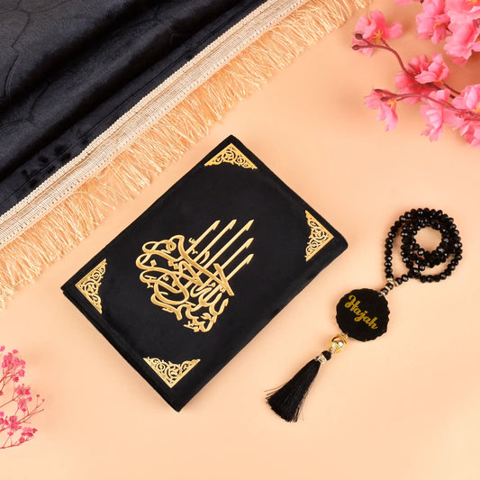 Black Salah Combo Hamper with premium velvet Quran, personalized tasbeeh, and janamaz. Elegant Islamic gift set for enhancing daily prayers.