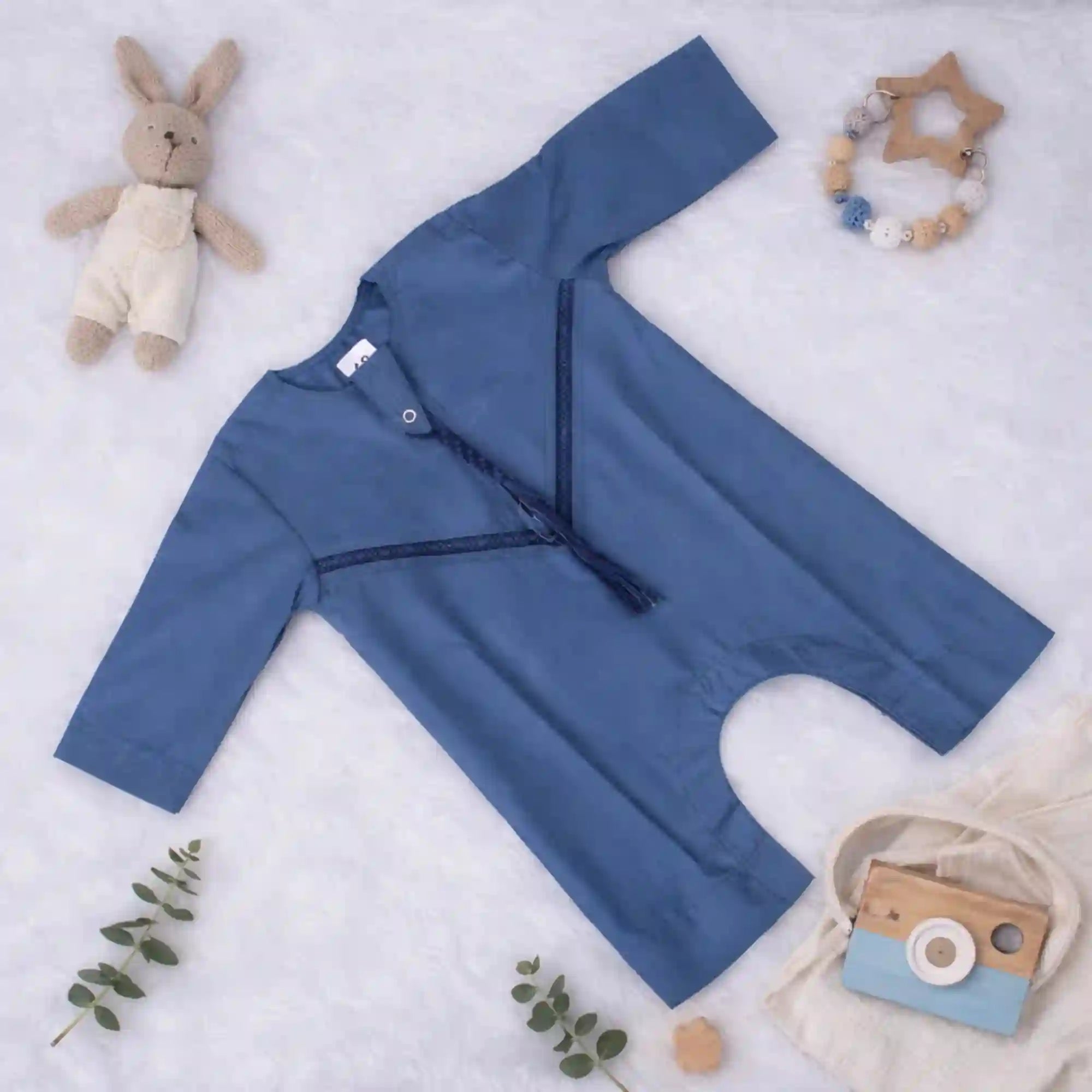 Blue Thobe Romper for Baby Boys in Omani style with tassel detail, ideal for EID. Soft fabric baby outfit from Kids Islamic Wear collection.
