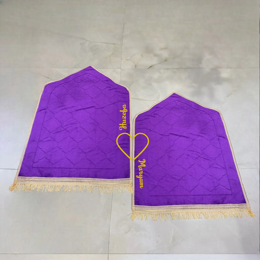 Pair of purple Janamaz with personalized names in yellow heart design. Included in the Bridal Quran Gift Set for couples.