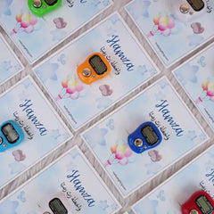 Diagonal layout of Hamza-themed digital Tasbeeh Favors in various colors, perfect for Islamic Aqiqah or wedding celebrations.