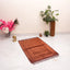 Brown Rectangle Janamaz - Custom Prayer Rugs | Personalized velvet mat displayed in a serene setting with floral decor, ideal for Ramadan or Eid gifts.