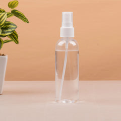 Clear spray bottle from Raah-e-Makkah Safar Essentials - Luxury Hajj Umrah Hampers, useful for personal hygiene during pilgrimage travel.