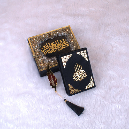 Black Mini Tilawat-e-Quran velvet box set with gold Arabic calligraphy and red feather bookmark. Luxurious handmade Islamic gift.