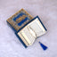 Blue Sequence Mini Tilawat-e-Quran with feather bookmark in open velvet box, part of Velvet Quran Gift Set for religious gifting.