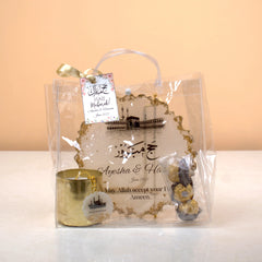 Gift bag with decorative elements and a tag on a light background