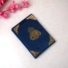 "Child reading from Noorani Qaida – foundational book for learning Quranic Arabic"