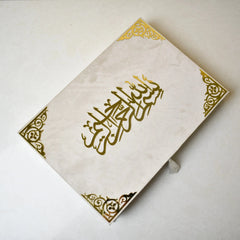 Offwhite Islamic hamper with devotional essentials and gourmet chocolates presented in a sophisticated A3 designer gift box