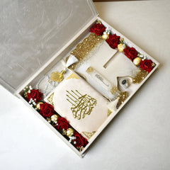Luxury Islamic gift hamper with Quran, crystal Tasbeeh, pearl digital counter, and elegant prayer accessories in a pearl-themed keepsake box