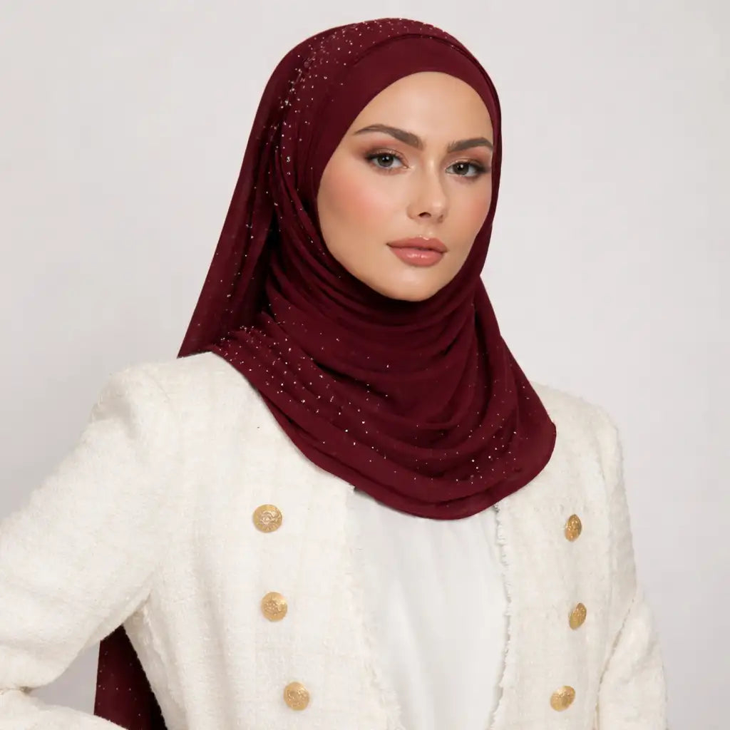 Deep red studded Hijab styled on a model, showcasing its smooth texture and elegant drape for modest fashion wear.