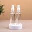 Travel Spray Bottle - Pack of 2 - Essential for Travel, shown upright on a white stand with clear liquid, ideal for Hajj or Umrah use.