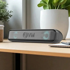 EnBar Plus Speaker - Rich Sound | Sleek Design, compact Bluetooth speaker on desk with glowing RGB lights, ideal for modern audio setups.