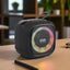 EnGroove Bluetooth Speaker with LED ring lights on a desk, showcasing its portable design and long battery life for on-the-go music lovers.