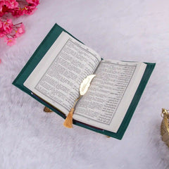 Quran with Urdu translation on Rehal and gold feather bookmark. Featured in Green Stones Rehal Hamper - Islamic gift set online.