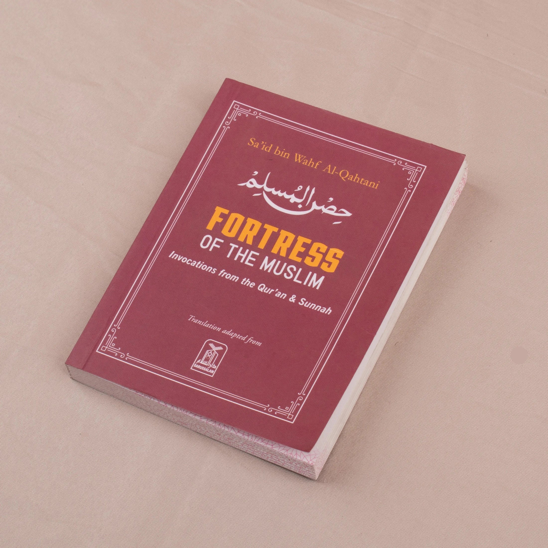 Fortress of the Muslim book included in Raah-e-Makkah Safar Essentials - Luxury Hajj Umrah Hampers, featuring Quranic and Sunnah invocations.