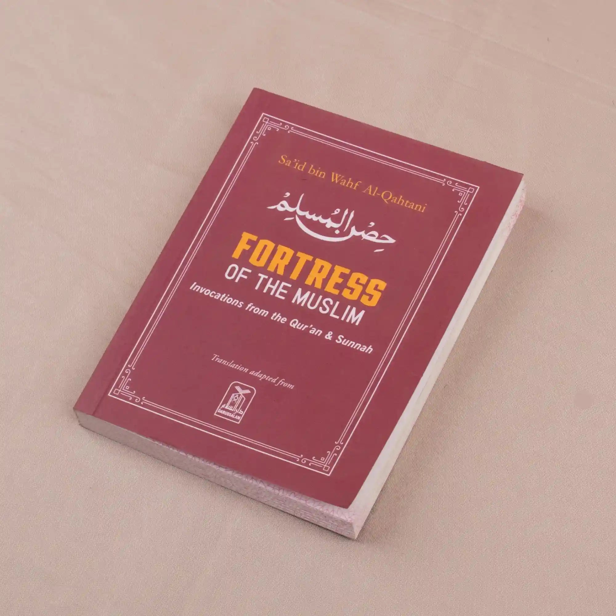 Fortress of the Muslim book included in Raah-e-Makkah Safar Essentials - Luxury Hajj Umrah Hampers, featuring Quranic and Sunnah invocations.
