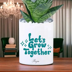 Personalized Sansevieria Snake Plant in decorative pot with custom name and message, perfect for home decor and gifting occasions.