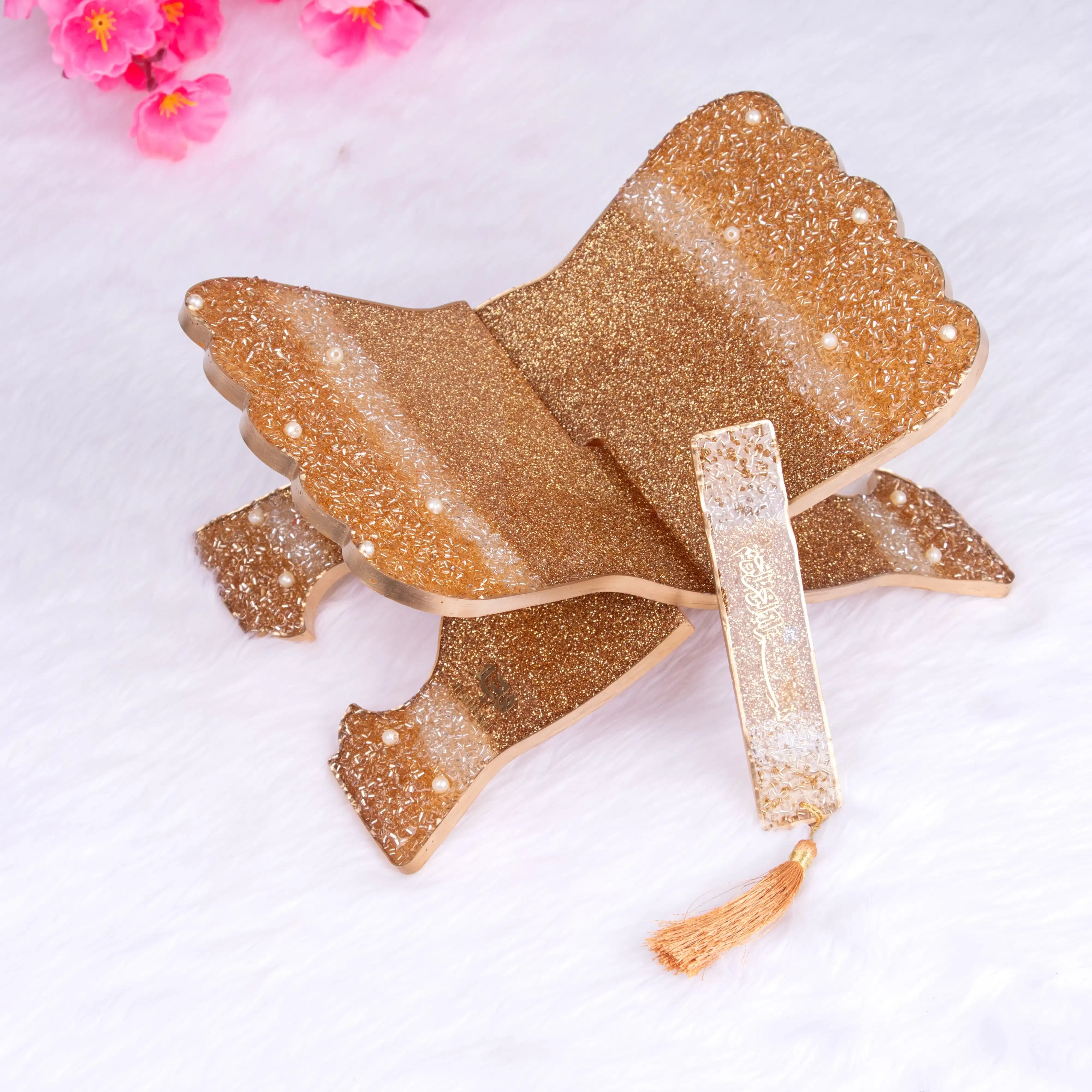 Golden resin Quran stand with glitter finish from the Bling Collection, part of the Sawab-e-Jariya spiritual gift set.