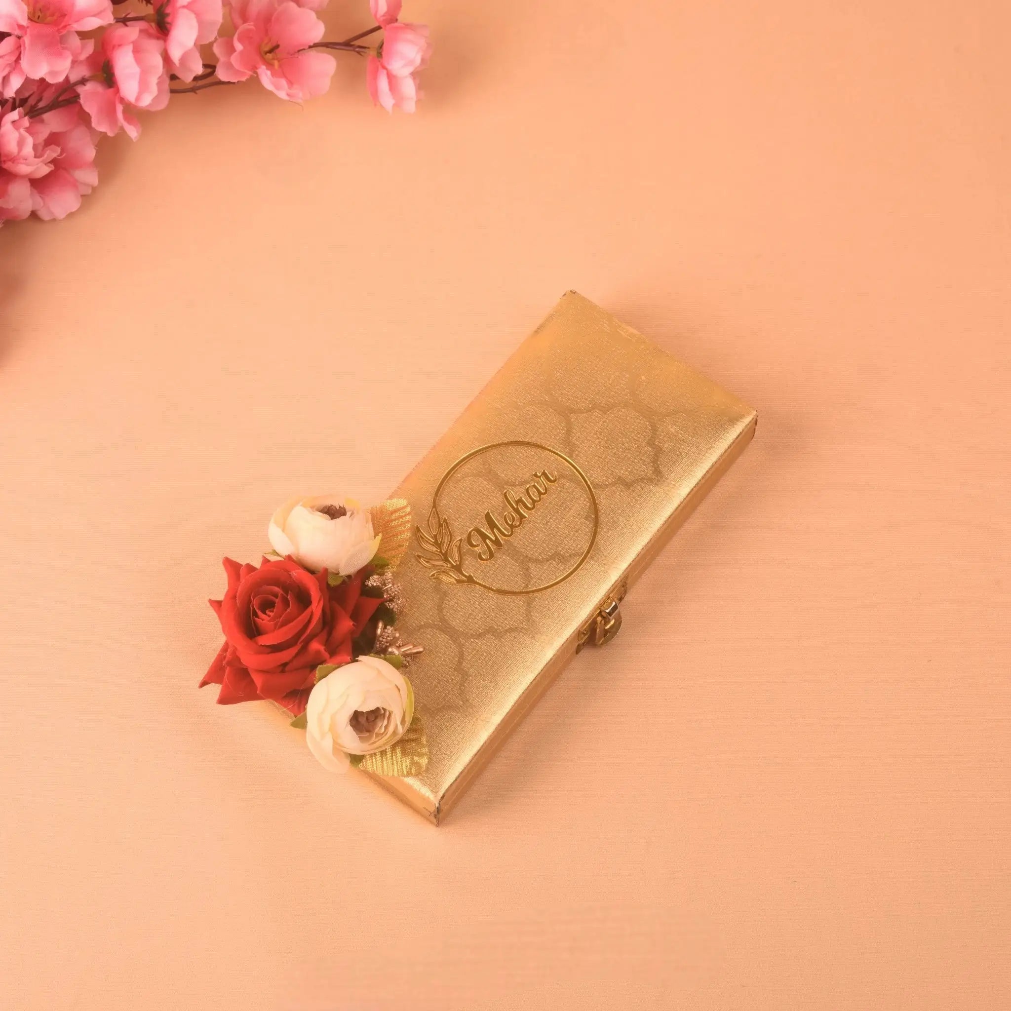 Golden Personalised Haqq Mahr Box adorned with floral accents, designed for Islamic wedding ceremonies and bride keepsakes.
