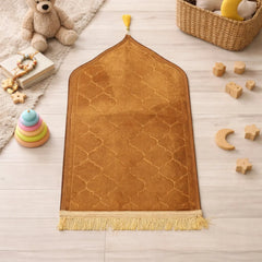 Golden Kids Dome Janamaz - Prayer Rug | Soft Fabric, Portable. Plush golden prayer mat with dome shape, surrounded by toys in a kids' room setting.