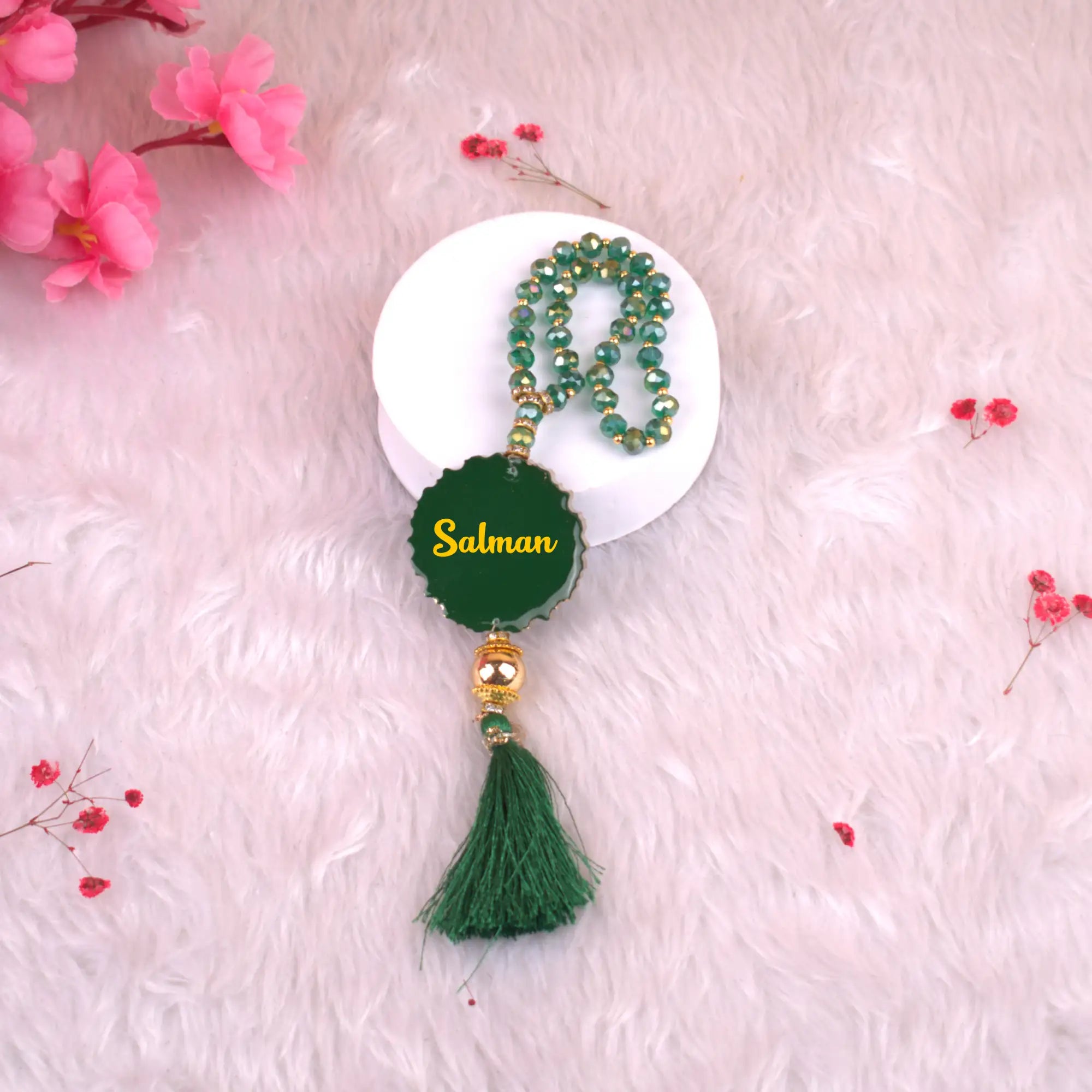 Green Tasbeeh Beads with Resin Agate featuring name 'Salman', 33 glitter beads perfect for Hajj gifts and religious ceremonies.