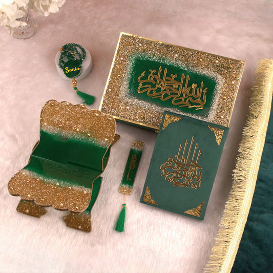Sawab-E-Jariya Hamper - Premium Quran Gift Set with green velvet Quran, glittered Rehal, Tasbeeh, and bookmark on a pink fur background.