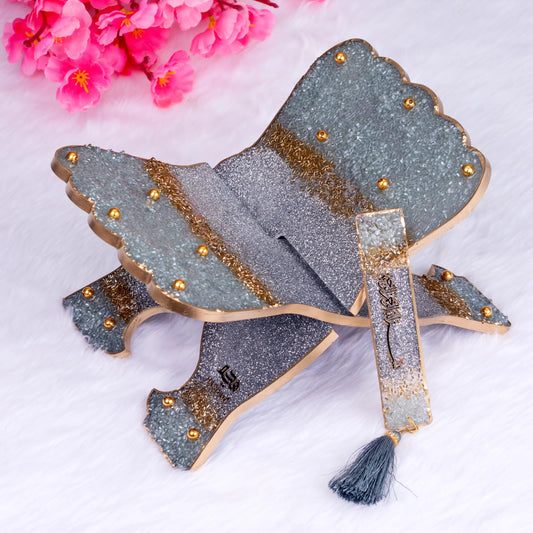 Silver Rehal Quran Stand from the Bling Collection, handcrafted in resin with gold accents and glitter finish, includes matching bookmark.