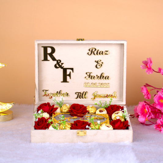 Luxe Meher Box - Bridal Edition in offwhite velvet with personalized gold initials, red roses, and Ferrero Rocher for Nikah ceremony.