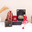 Barakah Velvet Gift Hamper for Eid featuring velvet Quran, Tasbeeh, Ajwa dates, and Islamic accessories in a luxurious black and red box.