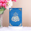 Blue Premium Velvet Covered Translation Quran with gold detailing, elegant Islamic gift available in multiple languages.