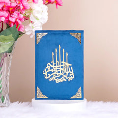 Velvet-covered Holy Quran with golden Arabic calligraphy from the Blue Sequence Rehal Hamper, perfect for gifting and personal use.