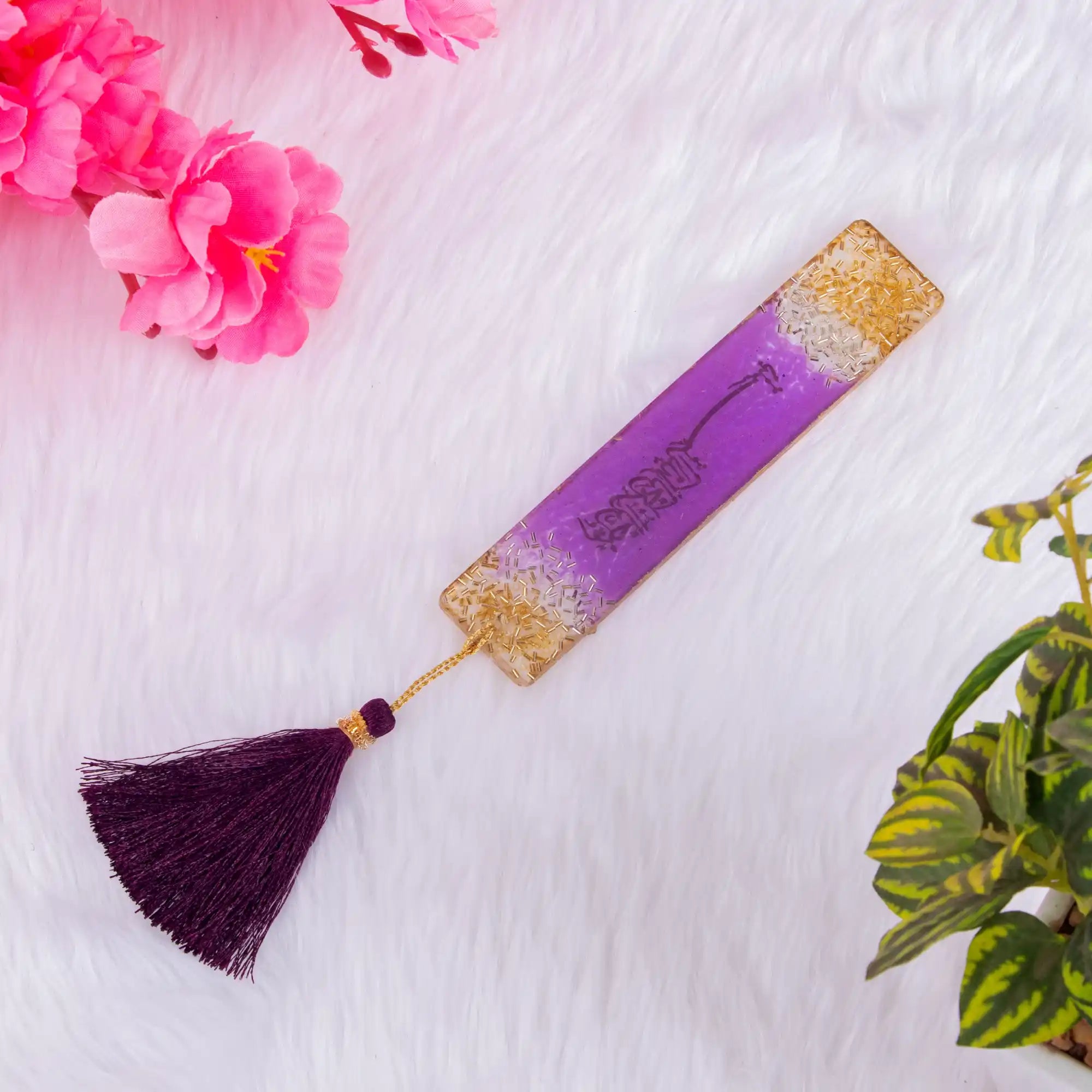 Purple and gold acrylic Islamic bookmark with tassel. A stylish addition to the Purple Quran Hamper Set for religious reading.