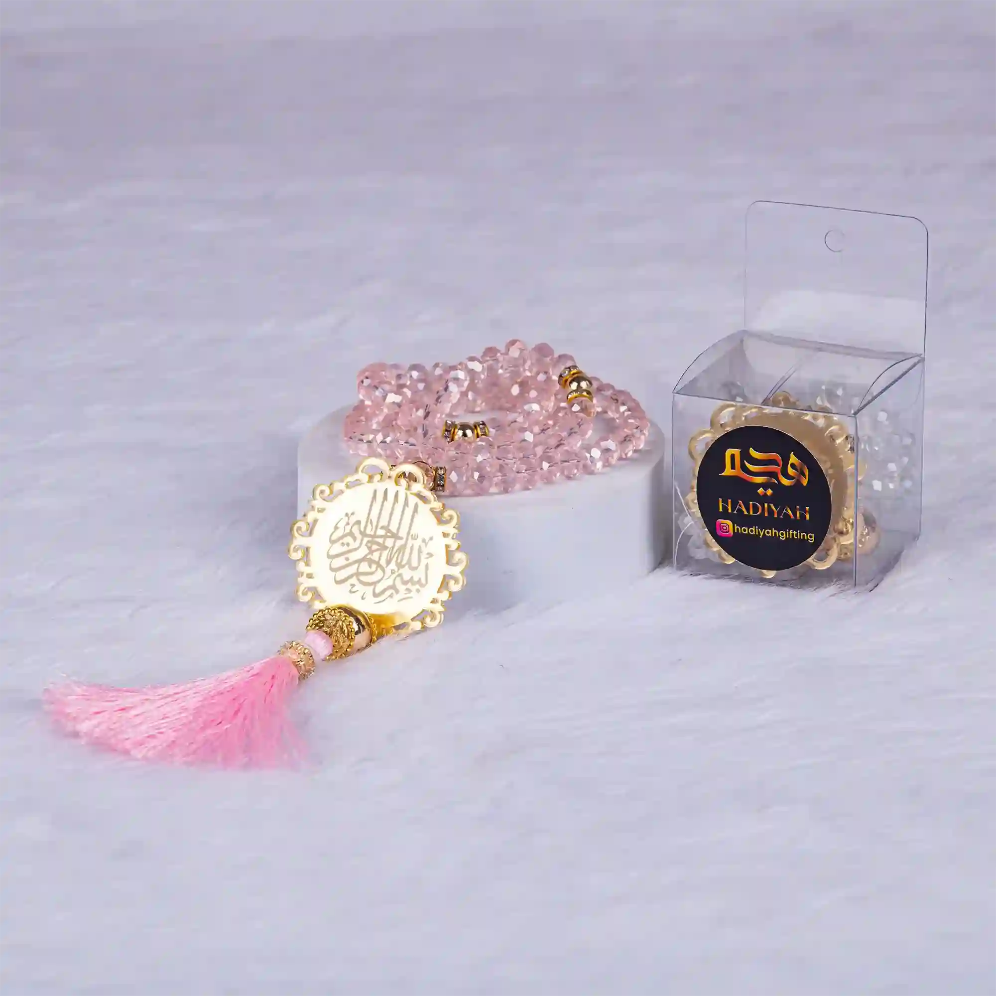 Pink Crystal Tasbeeh with Bismillah charm and tassel, elegantly packed for gifting; perfect for Hajj, Umrah, or wedding celebrations.