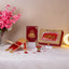 Maroon Sequence Rehal Hamper - Luxury Quran Gift Set featuring velvet Quran, glittered Rehal, acrylic Tasbeeh, and decorative box. Ideal Islamic gift.
