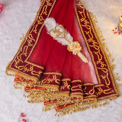 Red bridal dupatta with golden embroidery and a heart-shaped feather pen, part of the Amaanat-e-Nikaah wedding essentials collection.