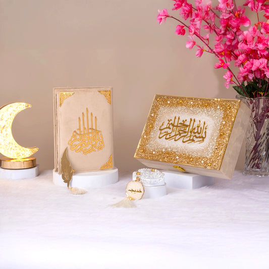Offwhite Quran Hamper - Tilawat e Quran Gift set featuring a decorative Quran, golden box, tasbeeh, and feather bookmark. Ideal for Islamic occasions.
