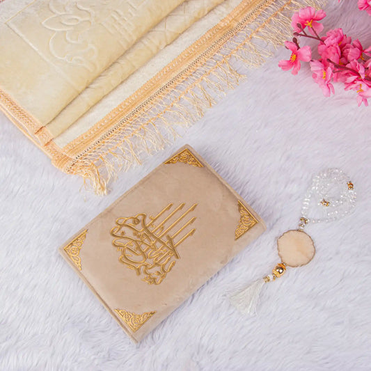 Customised Salah Combo Hamper with velvet Quran, crystal tasbeeh, and janamaz on white fur background. Ideal Islamic gift set for prayer rituals.