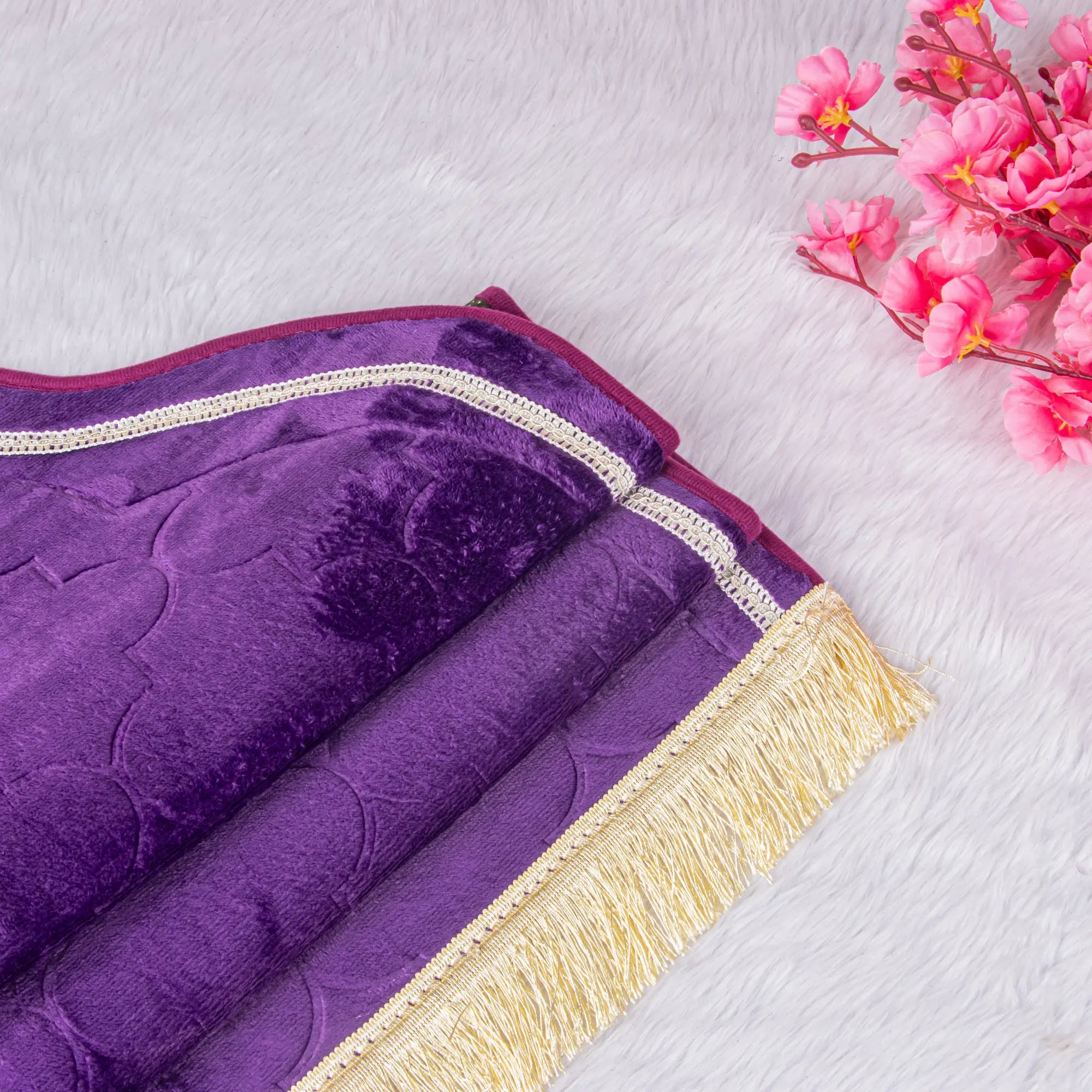 Close-up of the purple velvet janamaz with golden fringe from the Customised Purple Salah Combo Hamper, ideal for elegant prayer rituals.